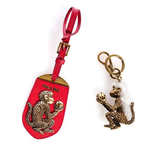 The monkey chatters bag charm Prada Gold in Metal 